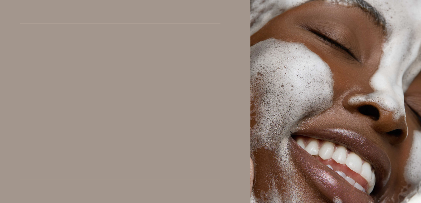 Close-up of a woman's face with a neutral background